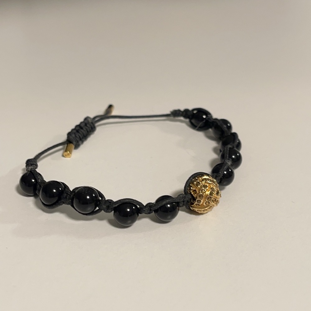 Swarovski black beaded bracelet with gold charm